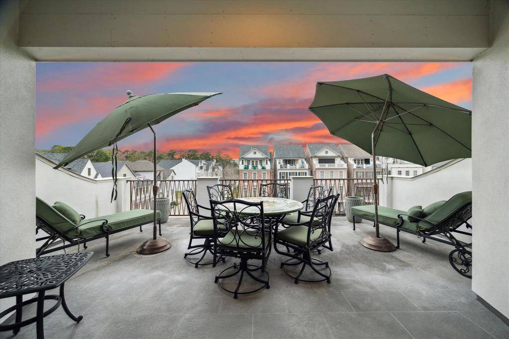 Beautiful and spacious outdoor entertainment and lounge area overlooking park.