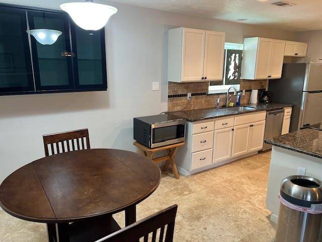 Kitchen, stainless appliances.