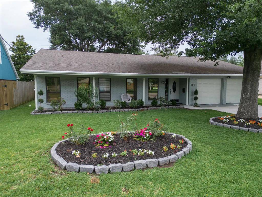 2 car garage and double drive way to park guests.