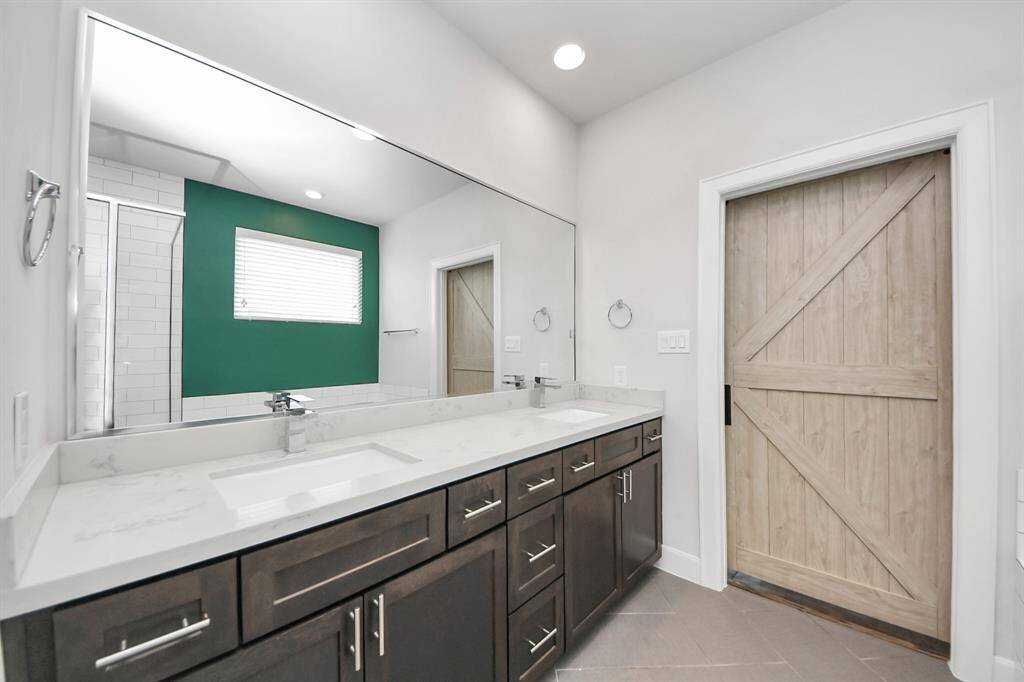 Primary Bathroom with Double Sinks/Sliding Barn Door