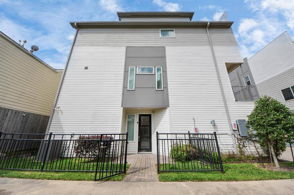 Side Front Door with Gated Entrance and large yard