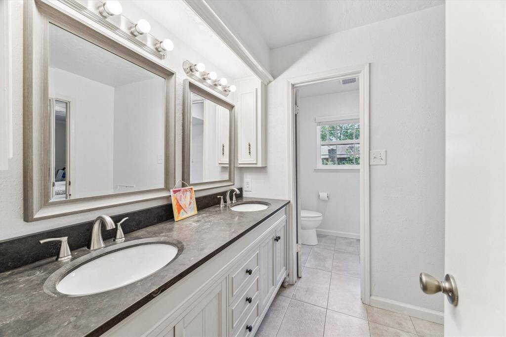 Bathroom #3 - updated counters, lighting and mirrors - separated tub/shower area from sinks