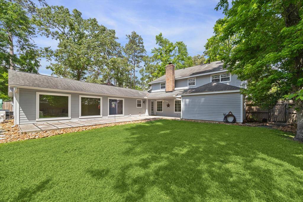 Back yard with room to play, grill, outdoor dine or just relax