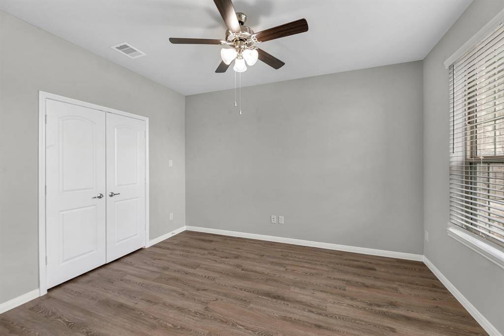 Another view of the office/study highlights the built-in closet, showcasing its potential to be used as an additional bedroom—perfect for guests, a nursery, or a flexible living space to suit your lifestyle.