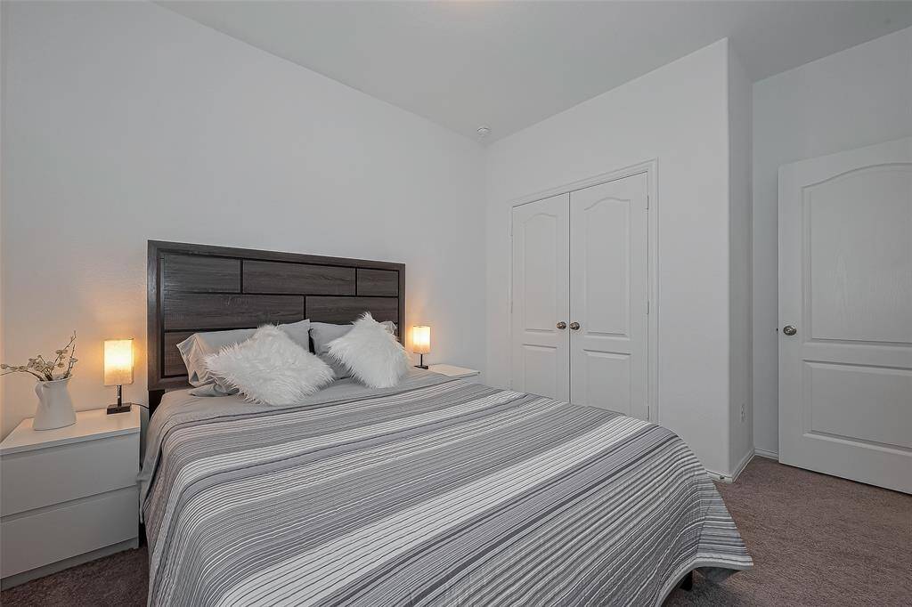 The room’s soft lighting and calming atmosphere make it an inviting space to relax and enjoy peaceful moments.