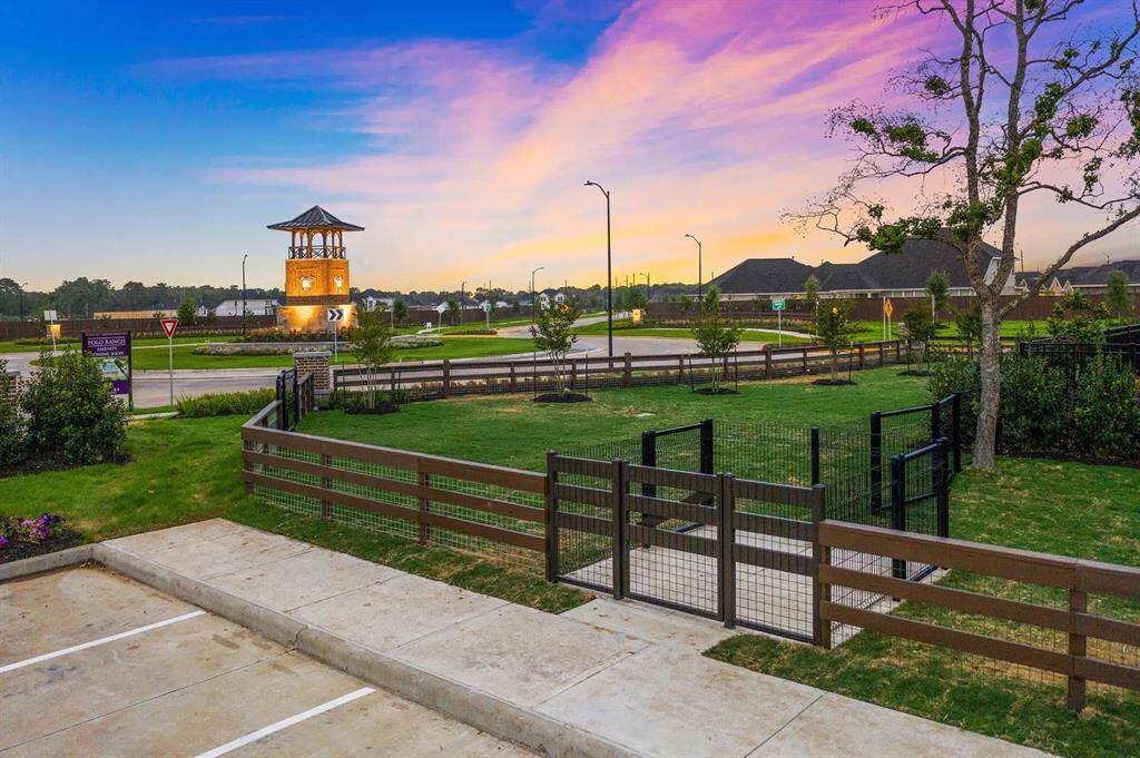 Beautiful community pool and dog park at Polo Ranch -- perfect blend of relaxation and recreation for residents and their four-legged friends!