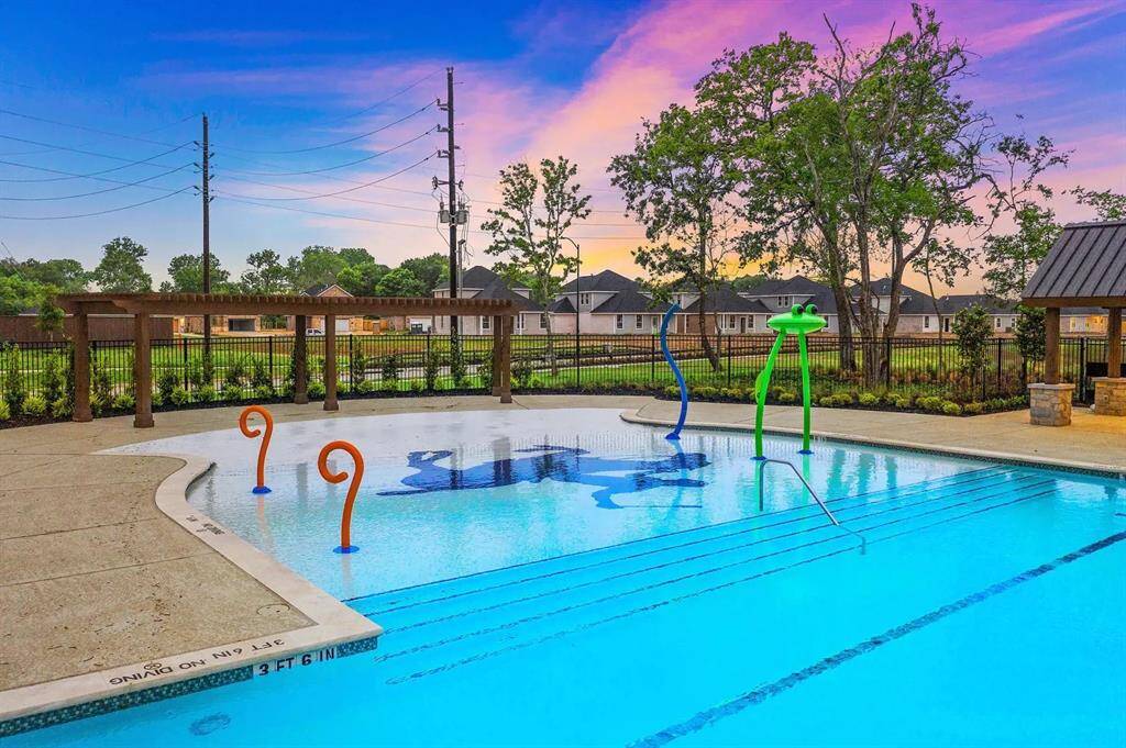 This thoughtfully designed splash pad blends seamlessly into the community pool, creating a safe and fun space for younger residents to cool off and play. With gentle water features and easy access from the main pool area, it’s perfect for family-friendly enjoyment just steps from home.