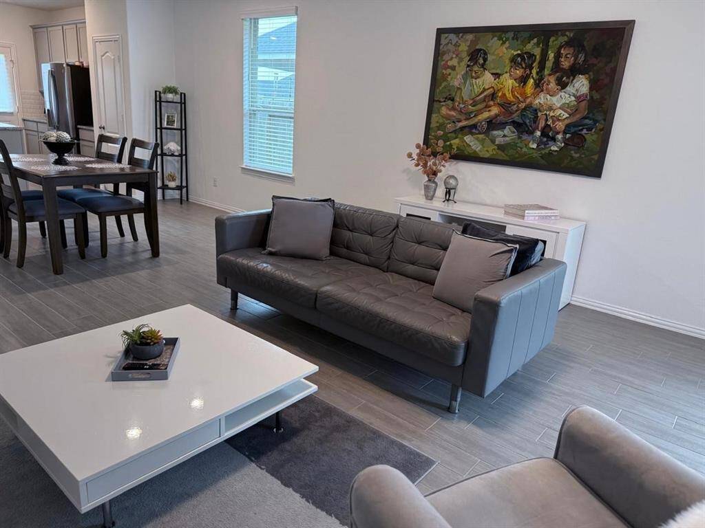 Perfect for everyday living or entertaining, this connected space brings everyone together while maintaining a warm and welcoming feel.
