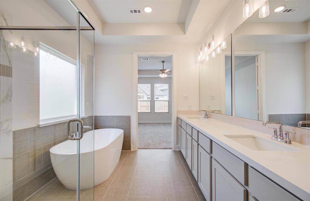 Seperate glass shower and soaker tub