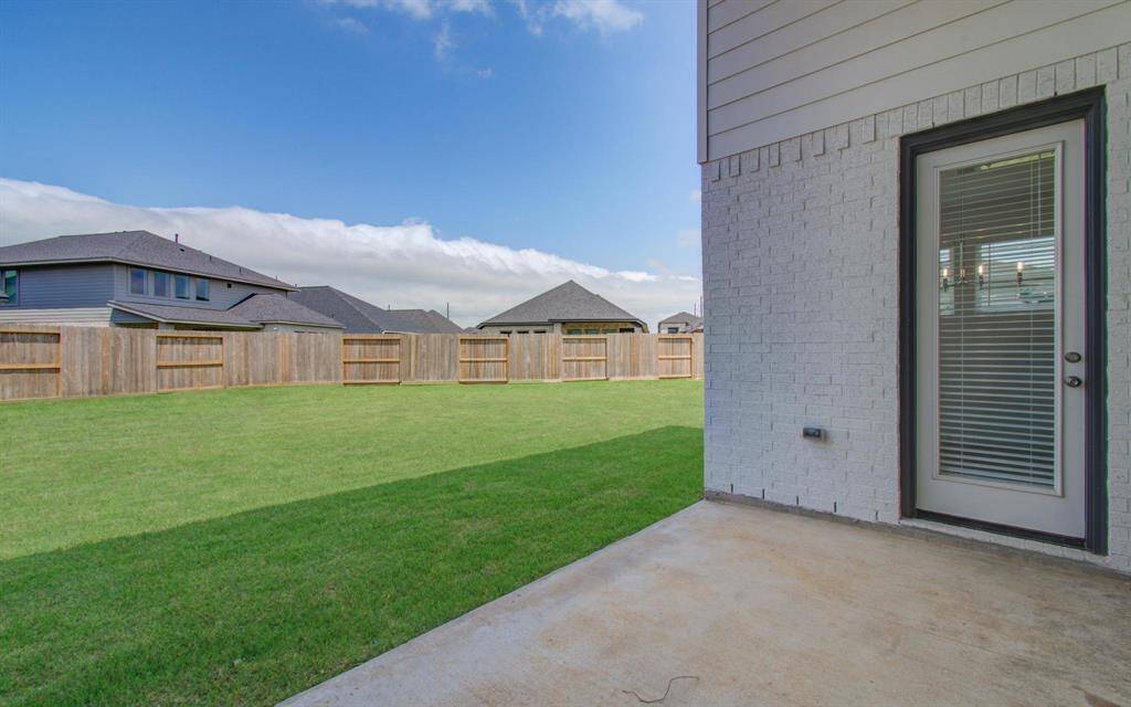 View of yard from covered patio