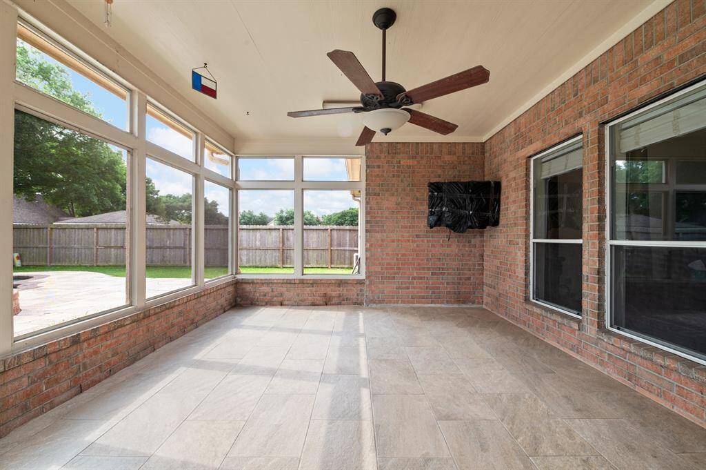 Enclosed sunroom to enjoy the outdoors without the elements.