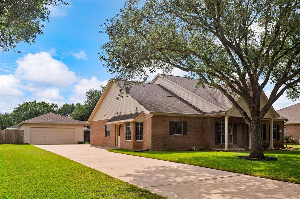 Long drive leads to detached garage