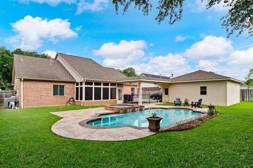 Large backyard with a gorgeous pool to keep cool all summer!