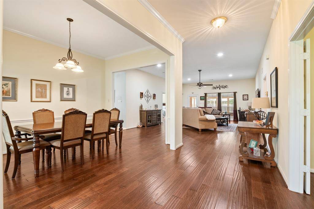 Open entry leads to a spacious formal dining