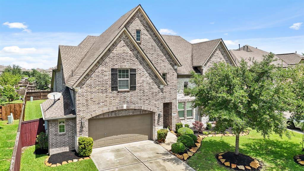 Discover your dream home! This stunning brick property features elegant architecture, a spacious two-car garage, and a beautifully landscaped yard. Perfect for comfortable living and entertaining.