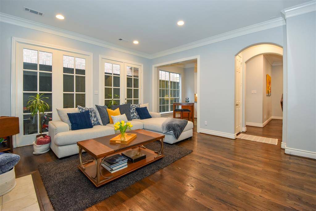 Alternate view of the family room which opens to a hallway, well thought of floor plan