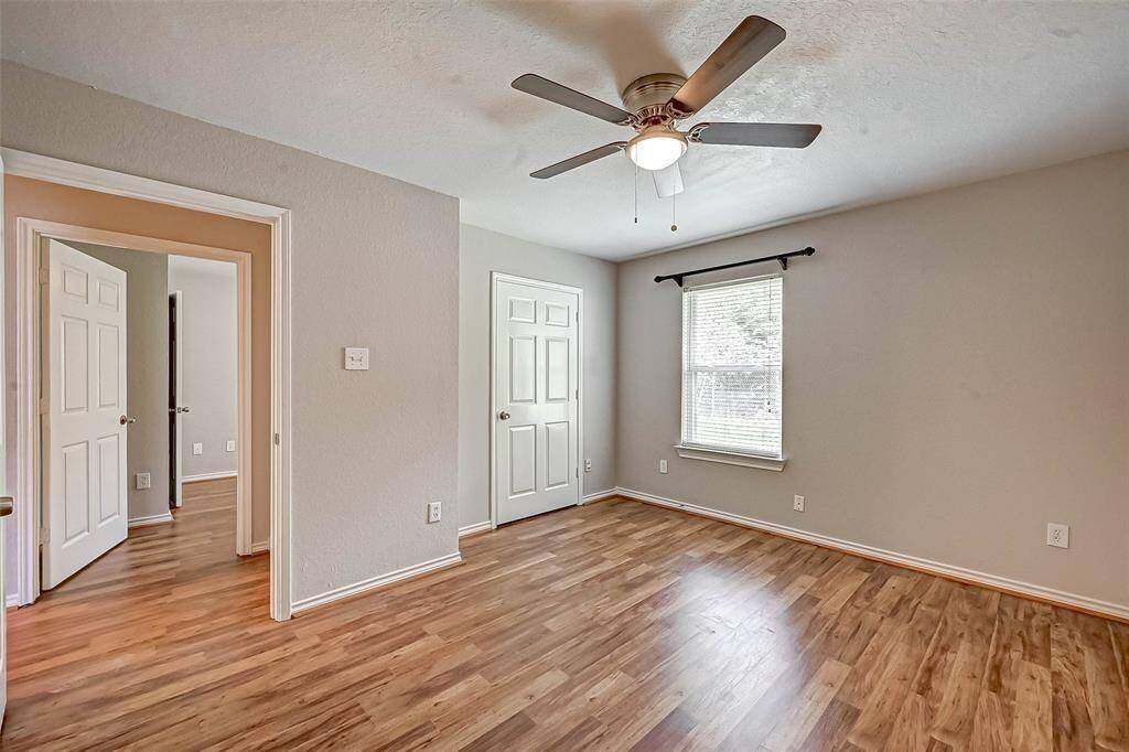 Bedroom 2 features its walk in closet.