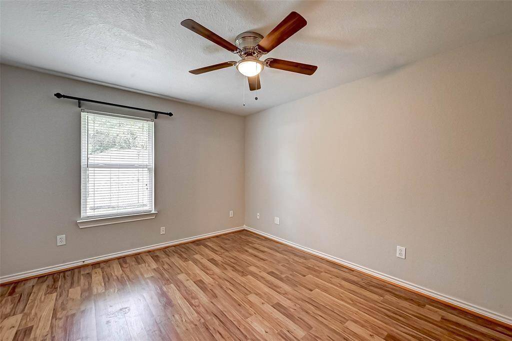 All bedrooms feature laminate wood flooring.