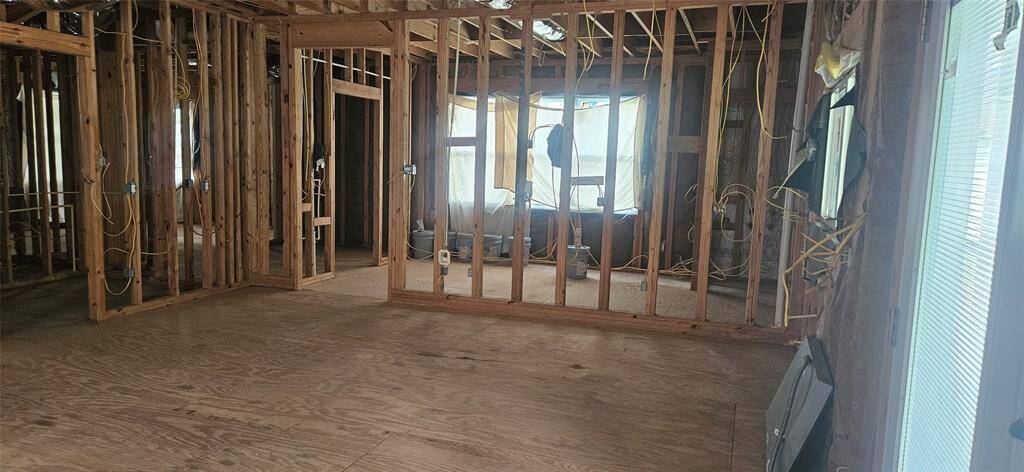 Viewpoint from the back porch access. This would be kitchen / dining room area. Toward the back of the photo would be the back door access to the home.