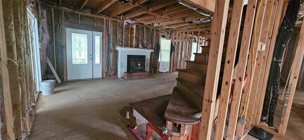 Living room / front door. On the far left is the sunroom.