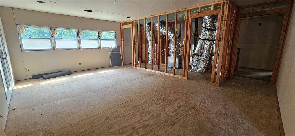 At the top of the stairs to the right is the Primary bedroom off the back of the home.