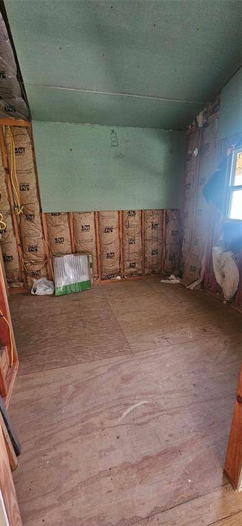 Upstairs bathroom and closet area.