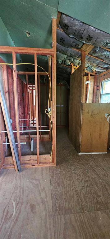 Upstairs bathroom and closet area.