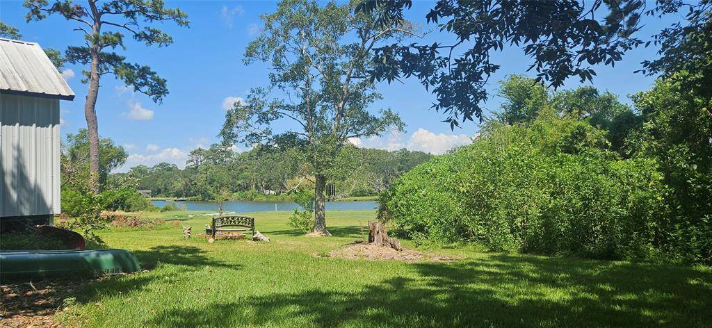View of the Bayou from this property through next door neighbor's yard.