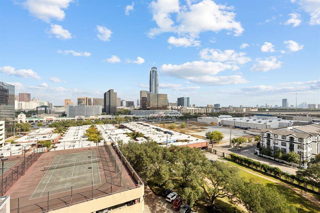 Two tennis courts sit atop the parking garage.
