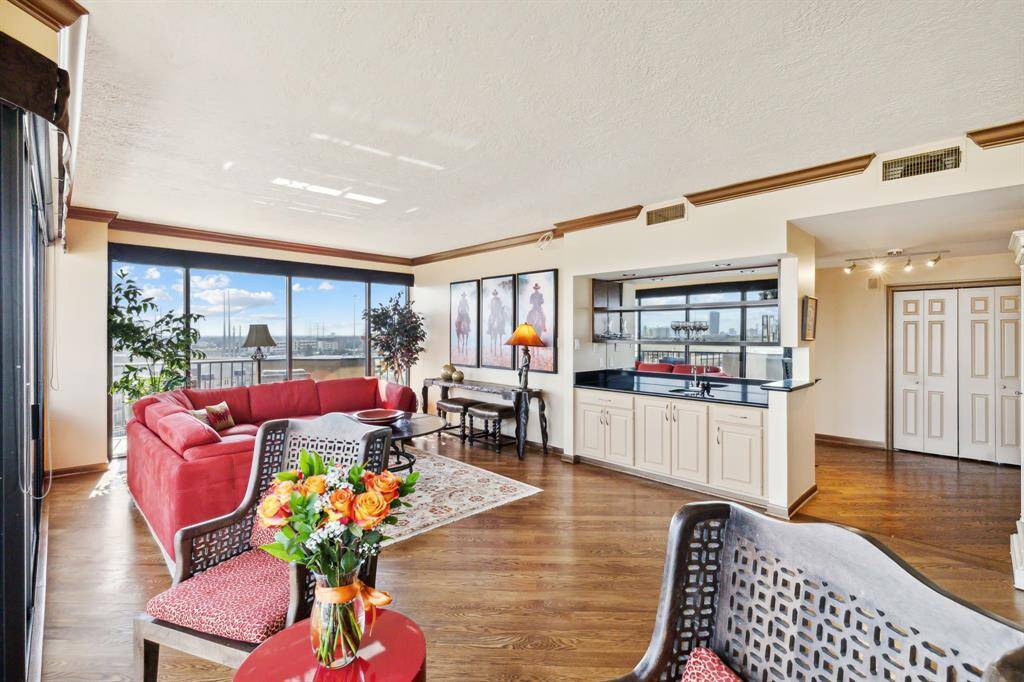 This angle showcases a bright and airy living space with an open floor plan.