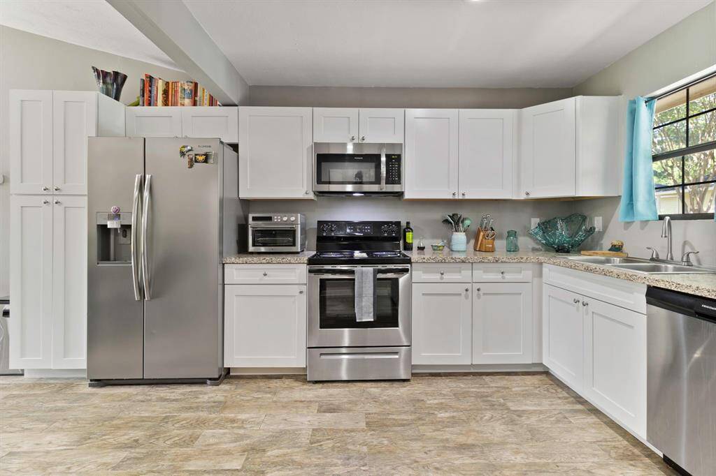 View from front door! All appliances including washer and dryer in laundry room (not shown) are yours to have ready to use on move-in day!