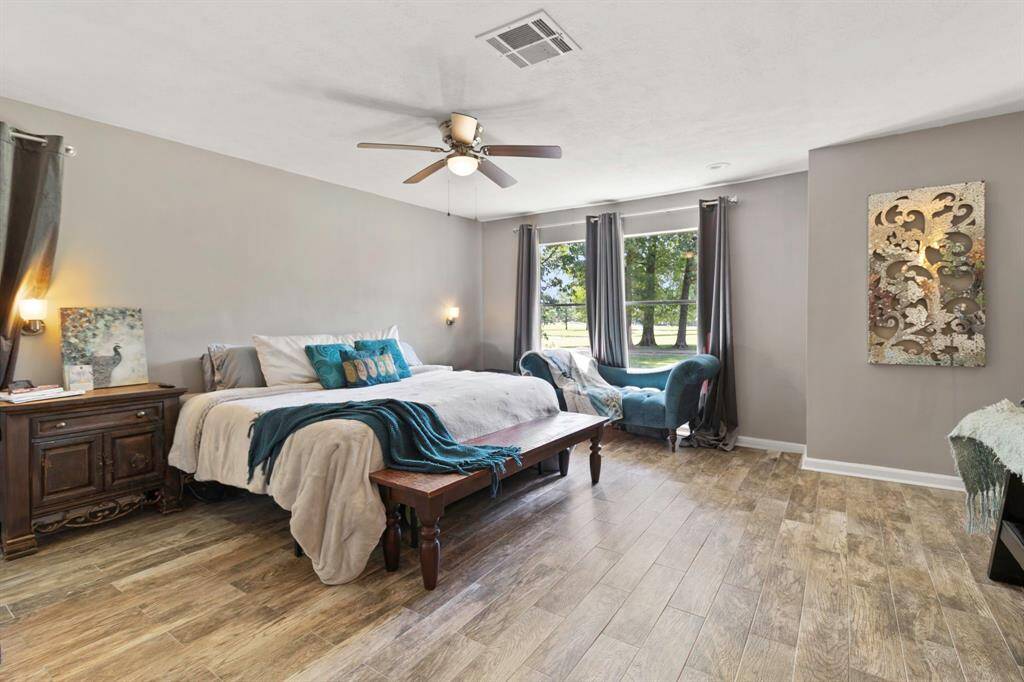 Welcome to one of two Master Suites with golf course views and visitors of various species of birds to the bird bath right outside your large windows. *Furniture options available *Furniture options available
