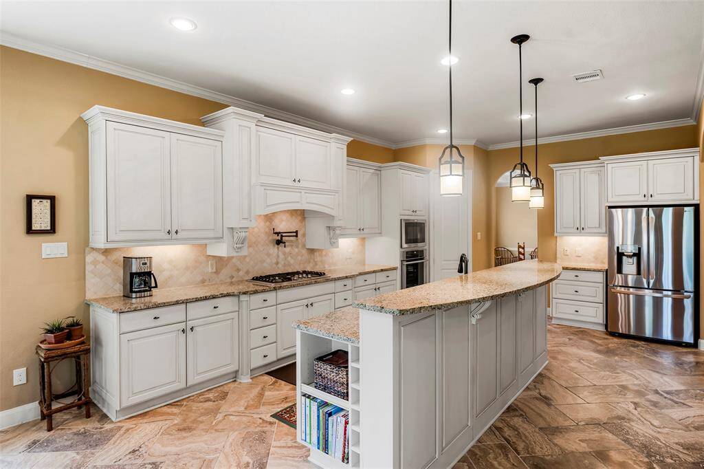 Kitchen has stainless steel appliances.  (Refrigerator is included).  The oven features a convection option.