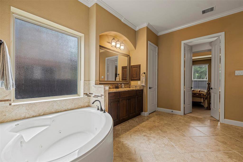You'll love the spa-like feeling with your corner jetted tub.