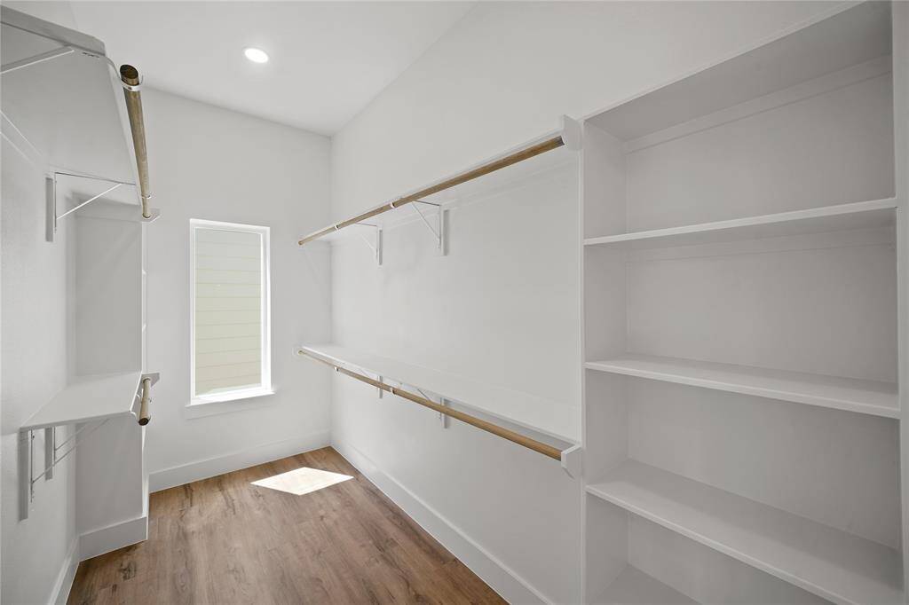Huge walk-in closet in the primary bathroom.