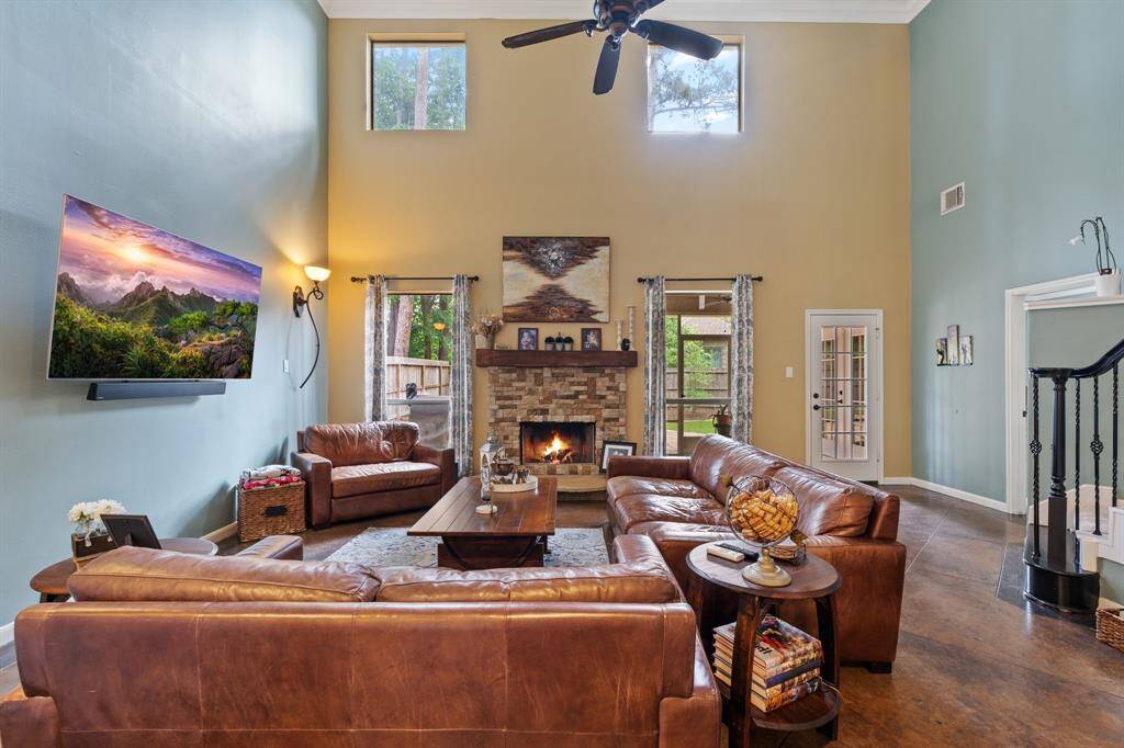 Formal living, large windows for natural light, high ceiling w/ fan