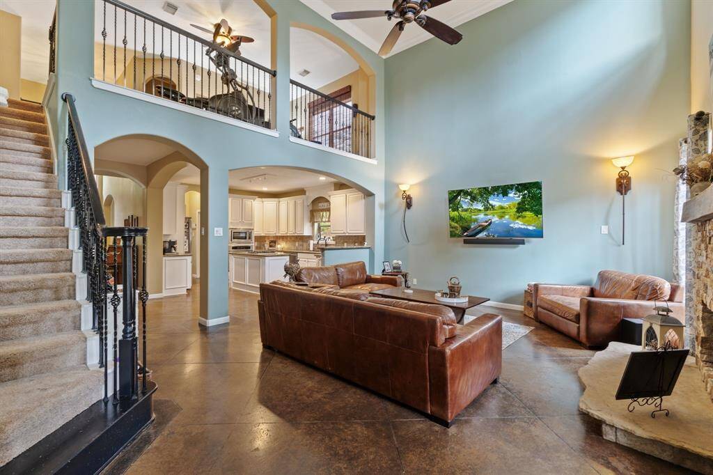 Formal living looking at stairs and loft