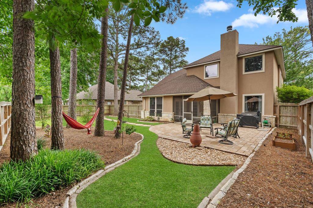 Backyard facing patio/house *Grass enhanced for visual reference.*