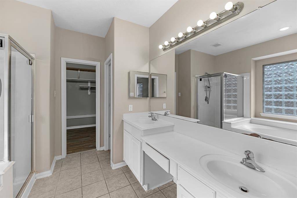 Double sinks & vanity.