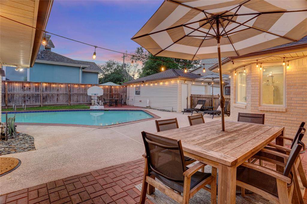 Wonderful Outdoor Living! The spacious Backyard features an expansive patio, large pool (baby gate available) and a large grass area.