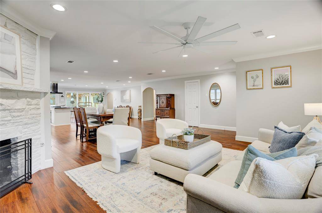 The Family Room is open to the Dining Room, Kitchen & Den, providing the perfect space for fun with family and friends.