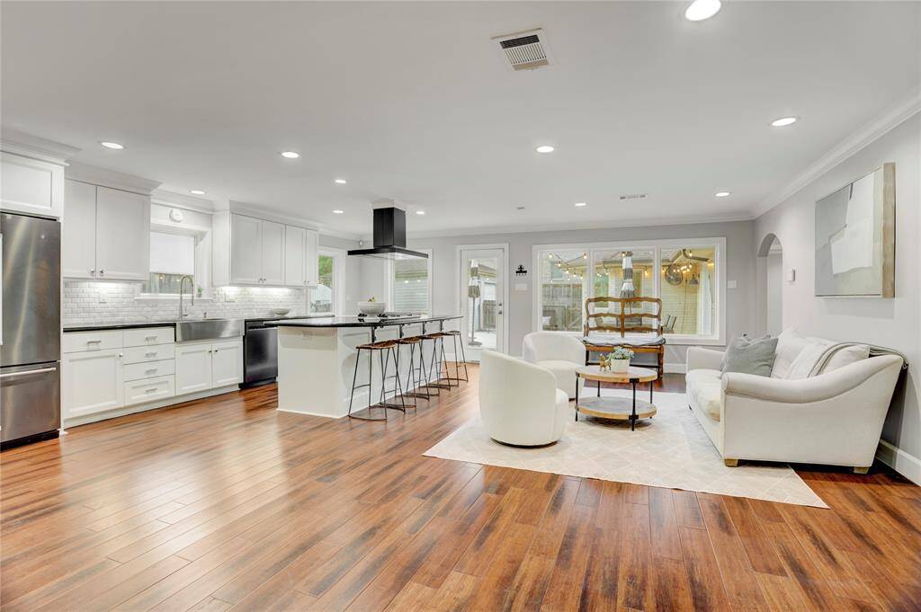 Open concept living in this updated home provides wonderful space for entertaining family and friends.