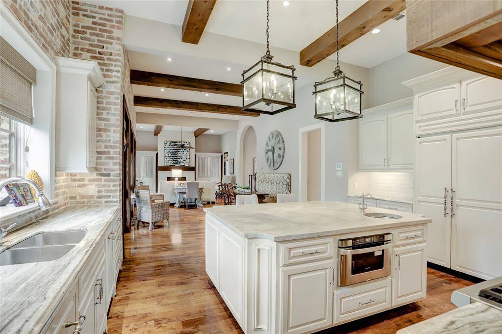 Additional view of the kitchen looking to the family room