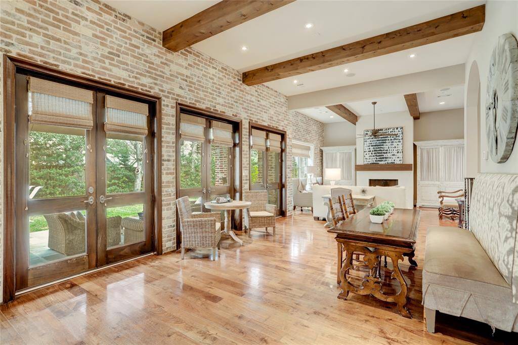 Look at all the natural light thru the wall of windows in the living spaces