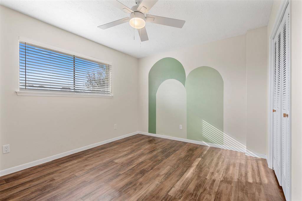 Bedroom 2 with accent wall
