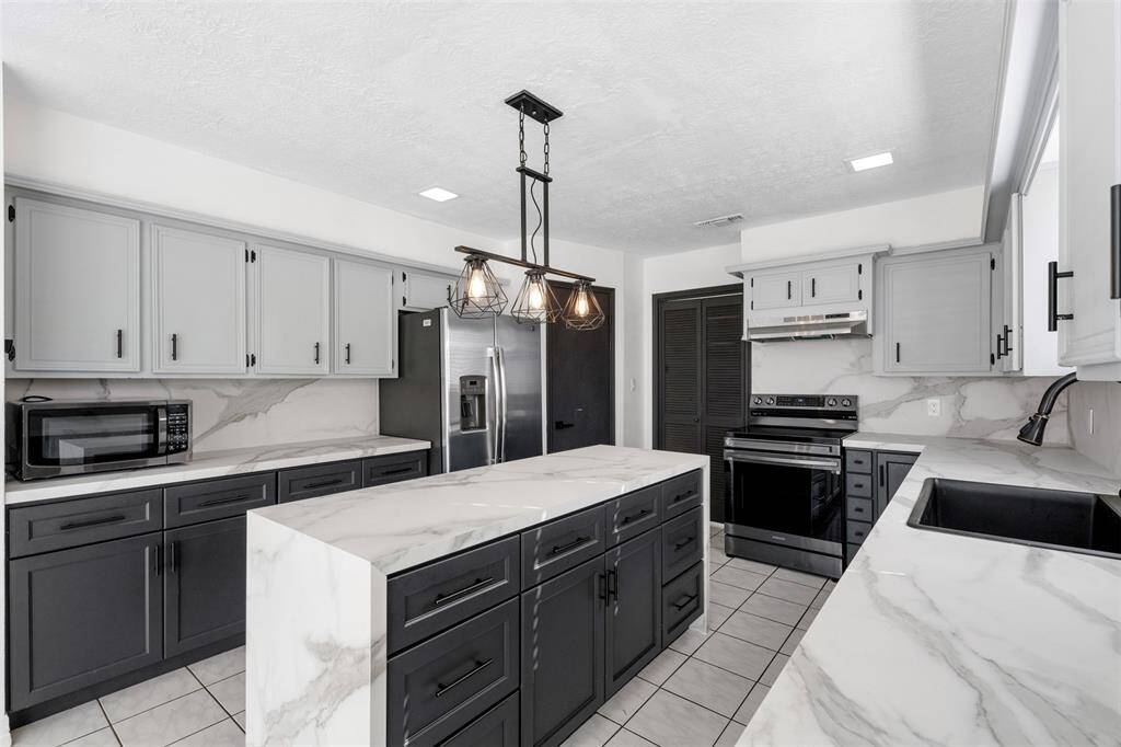 Gorgeous updated kitchen with stainless steel appliances