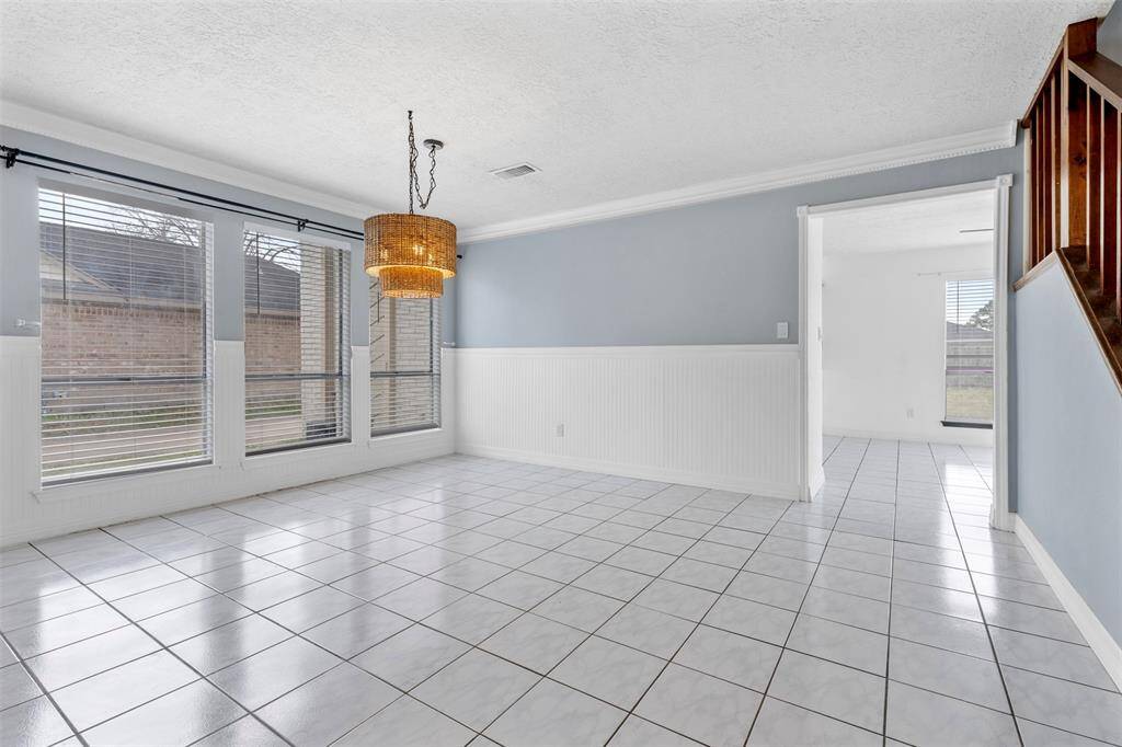 Formal dining space adjacent to living room