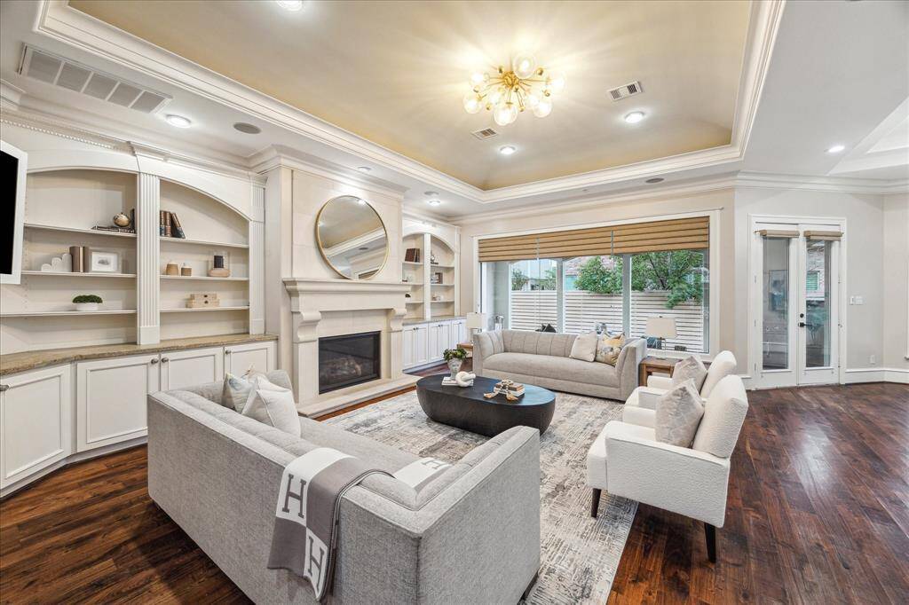 A wall of windows allows for an unobstructed view of the patio and back yard.