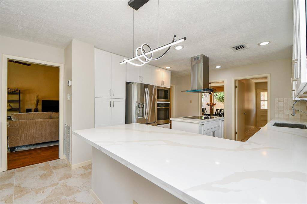 All new quartz kitchen countertops and backsplash