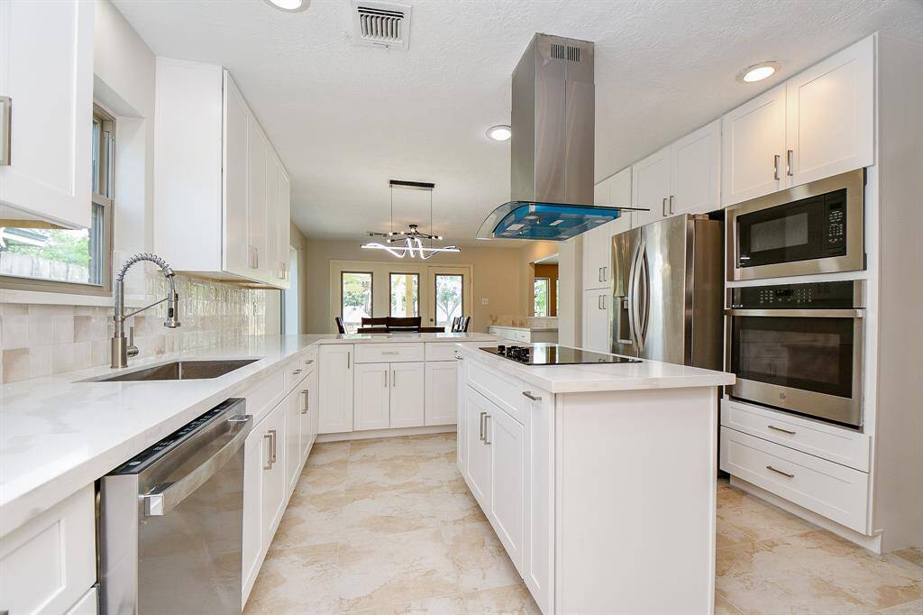 All new kitchen cabinets, new stainless steel ovens